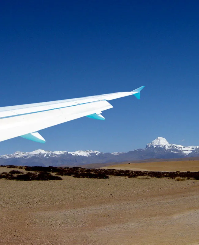 Aerial view of Mount Kailash showing the sacred peak and surrounding Himalayan landscape during Kailash Mansarovar Yatra