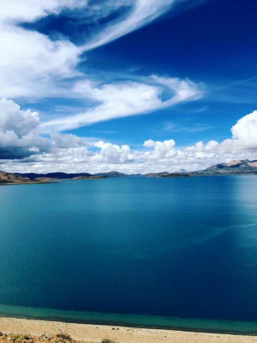 Panoramic view of Rakshas Tal, the mystical saltwater lake near Mount Kailash in Tibet