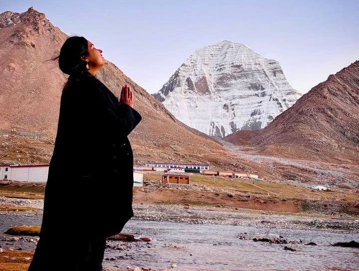 Australian pilgrims traveling to Kailash Mansarovar Yatra with Mount Kailash in the background